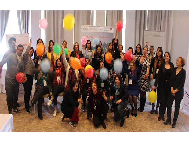 Group of people posing for photo with balloons in MENA region